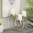 thumbnail image 3 of CosmoLiving by Cosmopolitan 3 Candle Silver Aluminum Metal Abstract Drip Candle Holder with Melting Designed Legs, Set of 3, 3 of 12