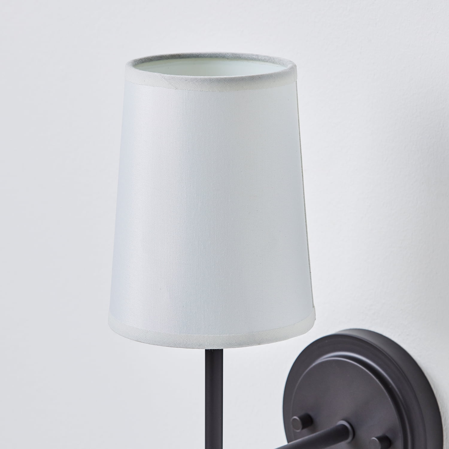 Better Homes & Gardens Matte Black 1-Light Indoor Wall Sconce, White Fabric Shade, Bulb Included