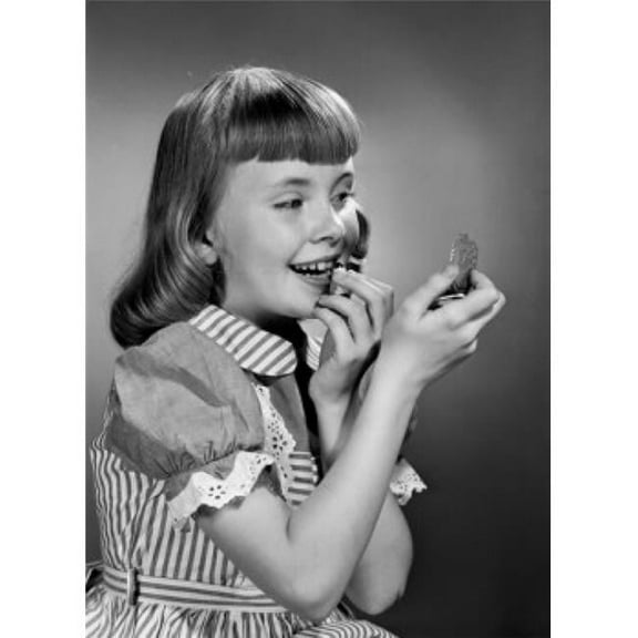 Girl Putting Lipstick on Poster Print - 18 x 24 in.