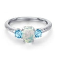 thumbnail image 3 of Gem Stone King 925 Sterling Silver Simulated White Opal and Swiss Blue Topaz Engagement Ring for Women | 1.40 Cttw | Oval Cabochon 7X5MM | Gemstone October Birthstone | Size 8, 3 of 6
