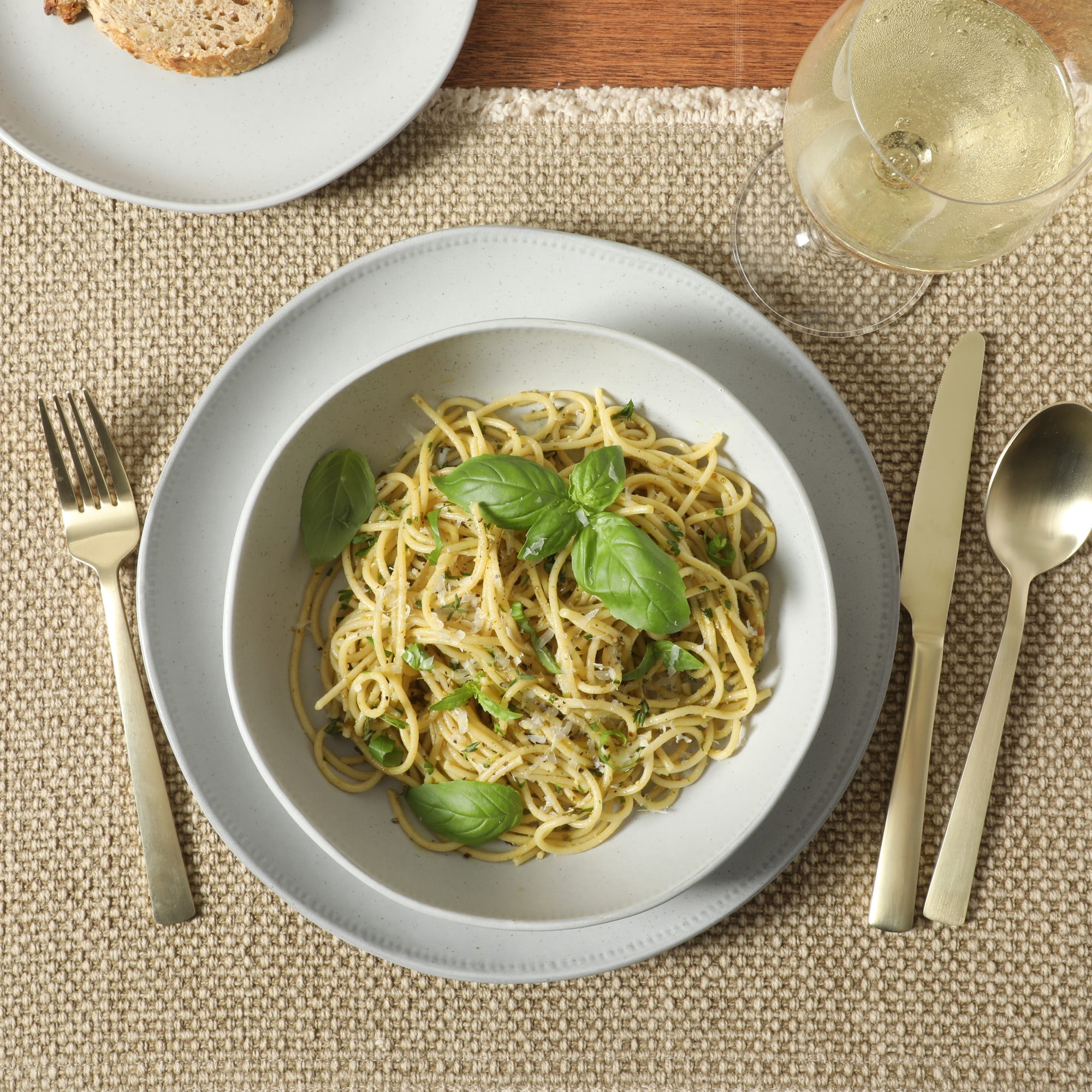 Gibson Elite Menlo Park 16-Piece Pottery Clay Stoneware Dinnerware Set – White Reactive Glaze, Embossed Plates and Bowls W/ Pasta Bowl, Service for 4 – Microwave & Dishwasher Safe