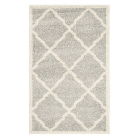 Safavieh AMHERST  BEIGE / ORANGE  6  X 9   Area Rug  AMT421F-6 AMHERST  BEIGE / ORANGE  6  X 9   Area Rug  AMT421F-6 Coordinate indoor and outdoor living spaces with fashion-right Amherst all-weather rugs by Safavieh. Power loomed of long-wearing polypropylene  beautiful cut pile Amherst rugs stand up to tough outdoor conditions with the aesthetics of indoor rugs. - Backing: No Backing - Color: BEIGE / ORANGE - Shape: Medium Rectangle - Size: 6  X 9  - Weight: 23 - Construction: Power Loomed - Pile Height: 0.39 - Fiber/Finish: 67% Polypropylene 18% Fibrillated Polypropylene 8% Latex 7% Poly-cotton(warp)