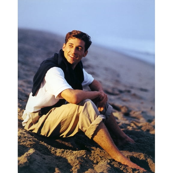 Patrick Dempsey sitting on Mountain Photo Print (24 x 30)