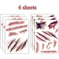 thumbnail image 4 of Horror realista falsa herida sangrienta puntada cicatriz costra impermeable tatuaje temporal pegatina Halloween mascarada broma accesorios de maquillaje-6 piezas, 4 of 5