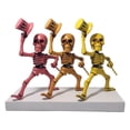 thumbnail image 1 of Sculpture Squelettes Dansants Rose, Orange, Jaune Ensemble de Têtes de Mort, 1 of 3