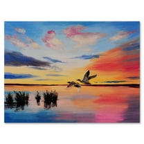 Designart ' Crane Birds Flying During Colorful Sunset ' Nautical & Coastal Canvas Wall Art Print
