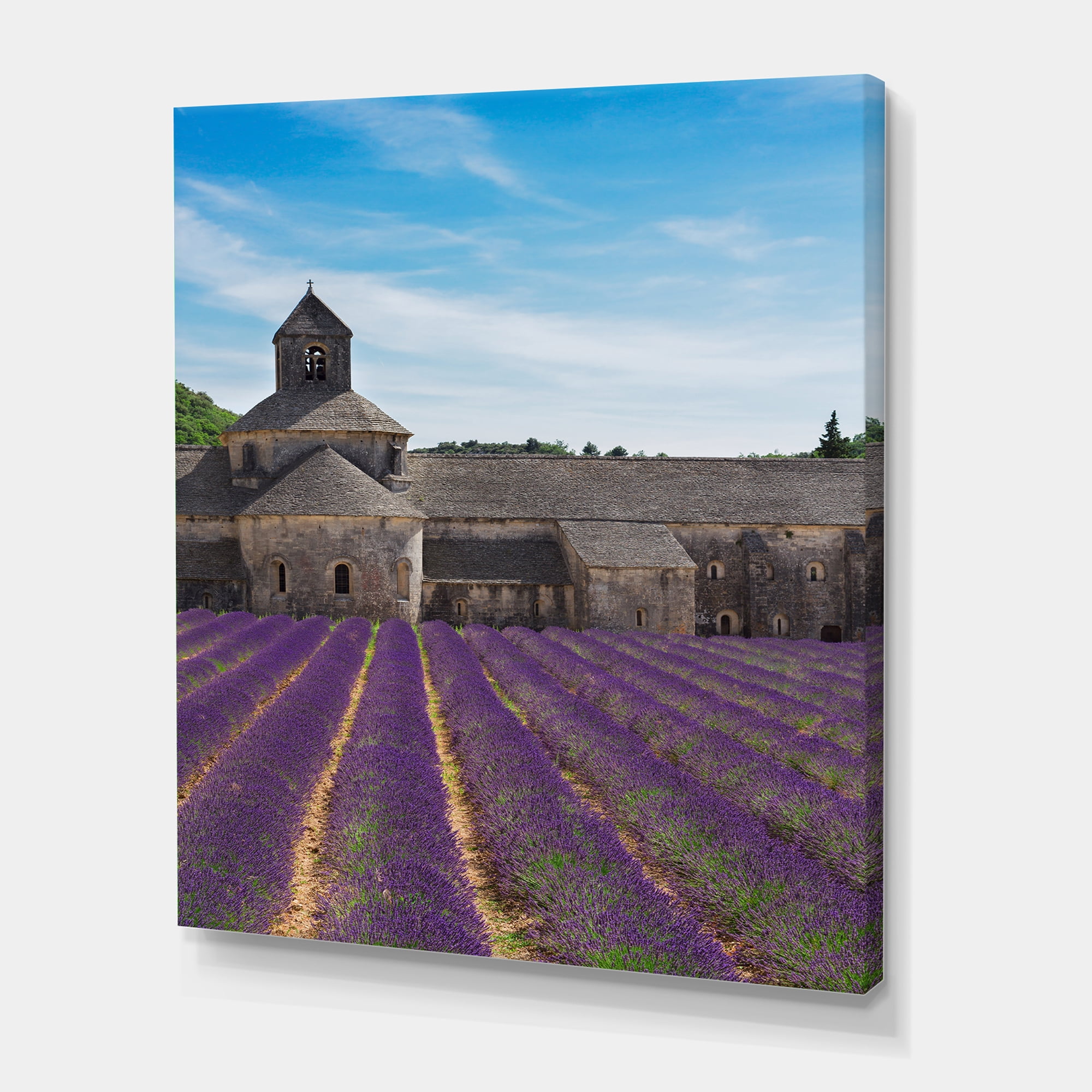 Abbey With Lavender Field In France 16 in x 40 in Photography Canvas Art Print, by Designart
