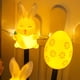 thumbnail image 4 of Juego de 6 luces solares LED de plástico con forma de conejito de Pascua, zanahoria y huevo de Pascua, para jardín, patio, exterior, montaje en suelo., 4 of 6