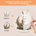 thumbnail image 3 of Rotating acrylic display featuring a realistic bunny on an Easter Crescent holding intricately detailed Easter eggs in ultra high definition against a white background, 3 of 8