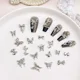 thumbnail image 3 of Accesorios de lujo para decoración de uñas en forma de mariposa hueca de metal blanco y oro K, decoraciones para uñas con forma de lazo para un arte de moda, 3 of 4