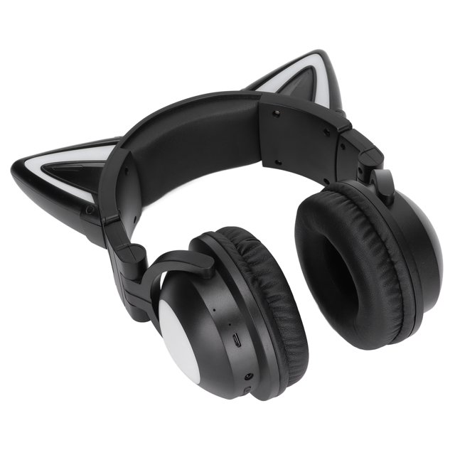 auriculares bluetooth de orejas de gato, auriculares negros con diadema acolchada y orejas LED, vista 3/4 frontal que muestra copas circumaurales acolchadas, controles laterales y puerto de carga USB, acabado ABS, uso inalámbrico o por cable, aptos para niños mayores de 3 años y adecuados para videollamadas o disfraces.