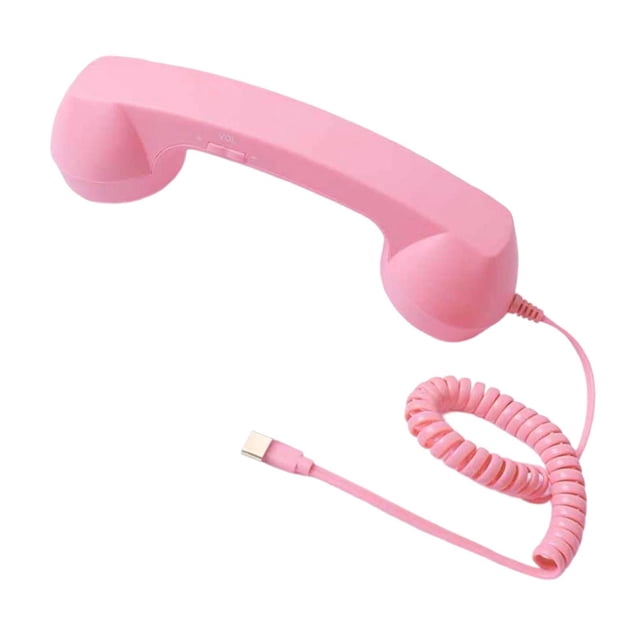 Teléfono retro vintage con micrófono y altavoz para llamadas móviles. rosa claro