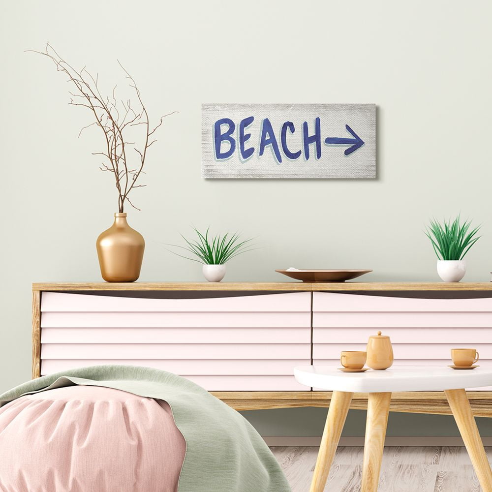 Stupell Industries Beach This Way Arrow Sign Blue White Word Design Canvas Wall Art Design by James Wiens, 10" x 24"