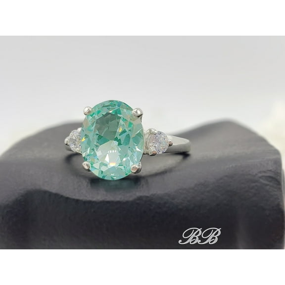9x7mm - 10x8mm Oval Cut Lab Created Sea Foam Blue Green Spinel, Cubic Zirconia Accents, Three Stone Ring, Sterling Silver