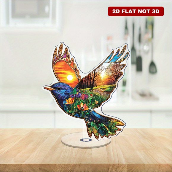 Rotating acrylic ornament featuring a robin silhouette in flight filled with vibrant colors, perfect for any decor