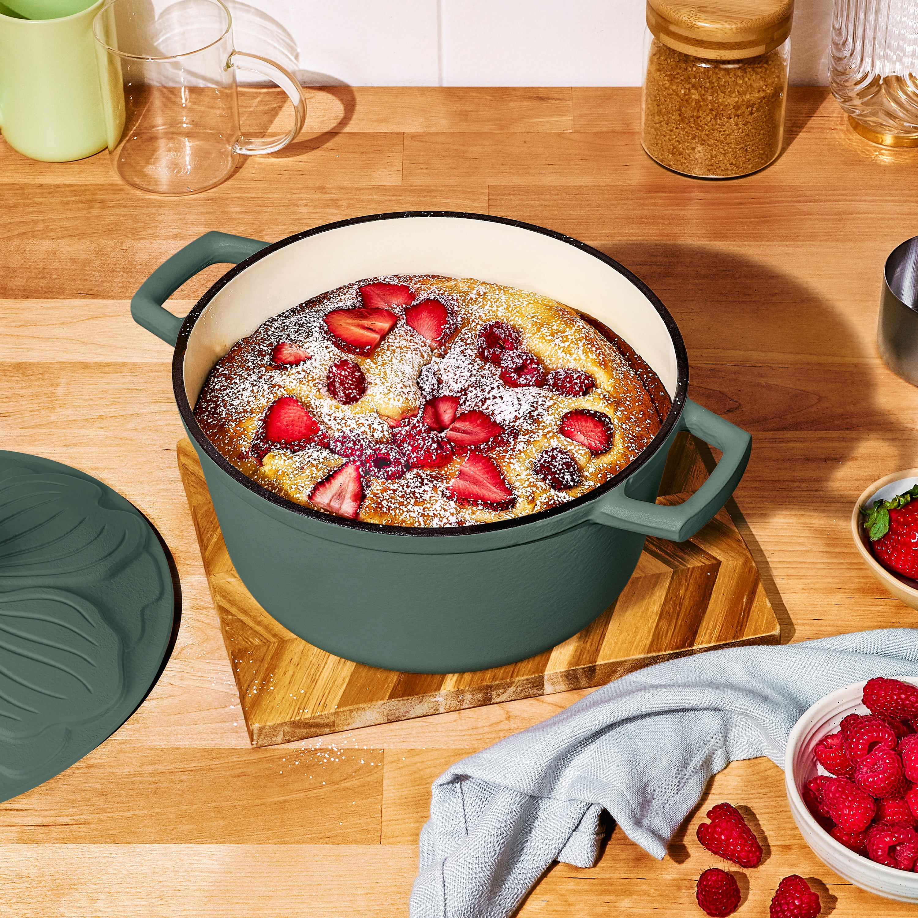 Beautiful 4 Quart Enameled Cast Iron Round Dutch Oven with Petal Design Lid, Thyme Green by Drew Barrymore