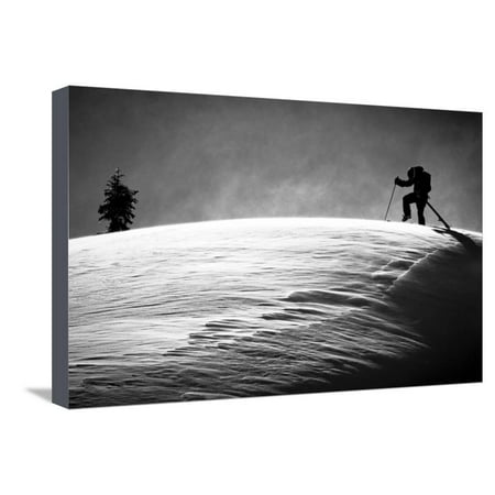 A Young Male Skier Clicks into His Bindings in the Backcountry Near Mt Baker Ski Area in Washington Stretched Canvas Print Wall Art By Jay