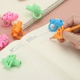 thumbnail image 5 of Uxcell 3 Pcs 3 Fingers Handwriting Pencil Grippers, Pink, Green, Light Blue, 5 of 6