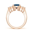 thumbnail image 2 of ANGARA Natural Oval 3.25 ct London Blue Topaz Cocktail Ring with Trio Diamonds in 14K Rose Gold for Women (Size-10x8mm) | November Birthstone Jewelry for Women | London Blue Topaz Ring (Ring Size - 9), 2 of 9