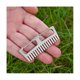 thumbnail image 1 of Mini peine para flequillo de titanio, peine para el cabello, Mini peine con hebilla colgante portátil de titanio antiestático para superar, 1 of 5
