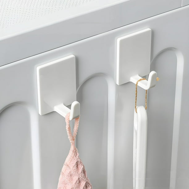 2 ganchos magnéticos laterales para refrigerador, para almacenamiento, con adhesivos magnéticos, blancos, resistentes, para toallas y utensilios de cocina. Gancho magnético de plástico.