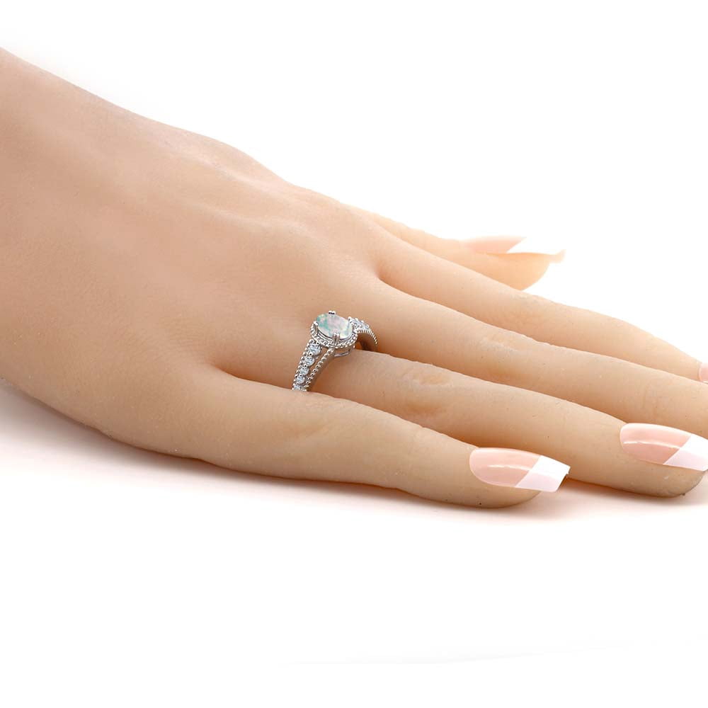 Gem Stone King 925 Sterling Silver White Simulated Opal and White Topaz Engagement Ring for Women (1.21 Cttw, Oval Cabochon 7X5MM, Available 5,6,7,8,9)
