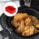 thumbnail image 5 of Yuarrent Bandeja de cocina para freidora de aire con mango, revestimiento que no se decolora, cesta de silicona reutilizable, accesorios para Cocina y Comedor Rojo 1 PC, 5 of 6