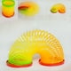 thumbnail image 3 of Juguete clásico divertido de plástico de colores aleatorios con arcoíris para primavera para niños, 3 of 4
