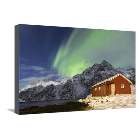 Northern Lights (Aurora Borealis) Illuminate Snowy Peaks and Wooden Cabin on a Starry Night Stretched Canvas Print Wall Art By Roberto