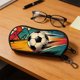 thumbnail image 1 of Funda para gafas con temática de fútbol, clip mosquetón, cierre de cremallera, material de neopreno suave, tamaño compacto, ideal para gafas de sol, gafas graduadas, llaves y accesorios pequeños., 1 of 6