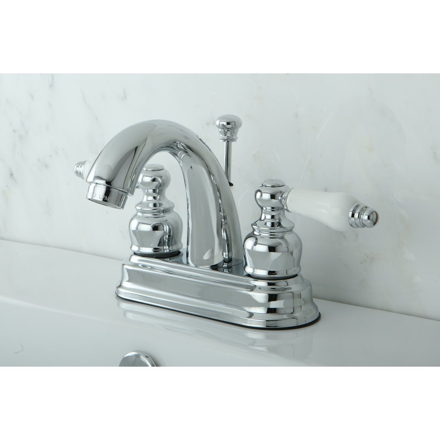 Kingston Brass Restoration Two Handle 4" Centerset Lavatory Faucet with Retail Pop-up