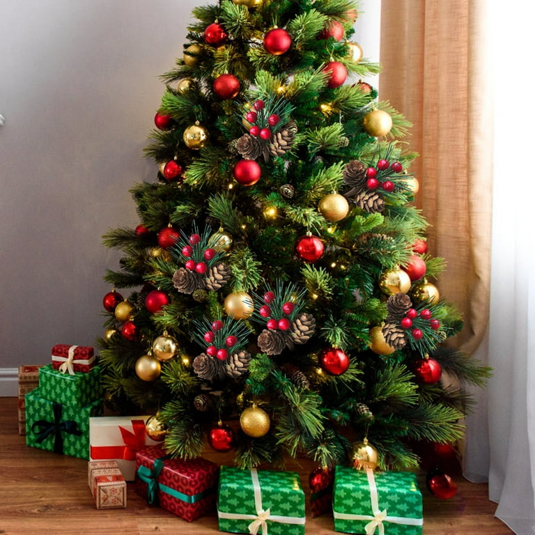 green Christmas tree decorated with red toys, ornaments, pine