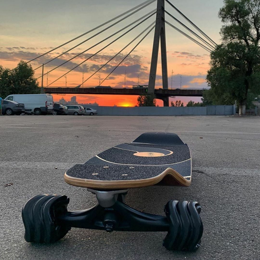 Astral 39 inch Maple Drop Down Longboard with 72mm DNA formula Shark Wheels