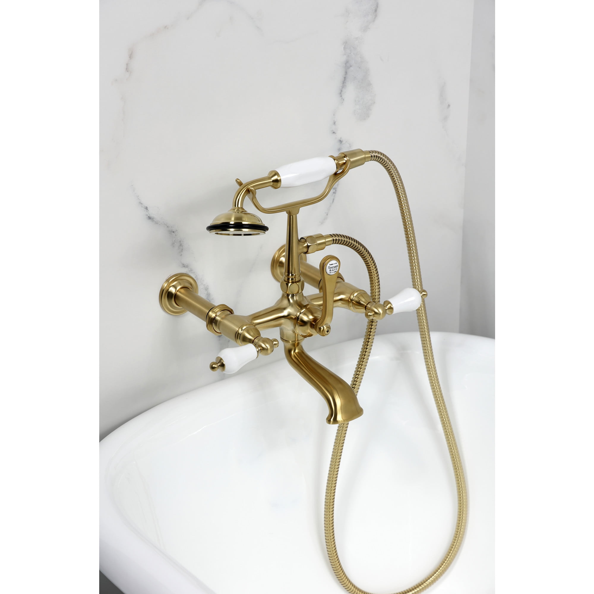 Kingston Brass CC543T7 Vintage 7-Inch Wall Mount Tub Faucet with Hand Shower, Brushed Brass