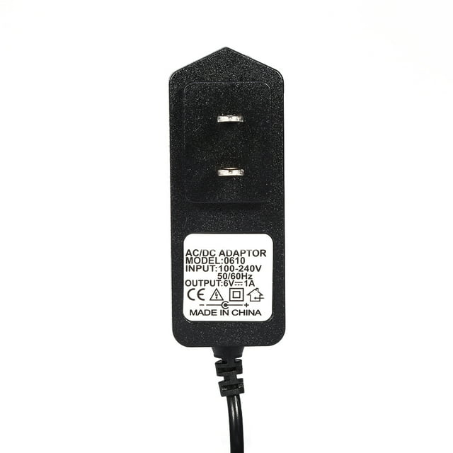 Ac Dc Power Adapter Power Adapter Wall 1PCS AC 100V-240V US Plug Converter Adapter DC 6V 1A 5.5mm Power Supply. The black adapter features a standard US plug with input specifications of 100-240V AC and output of DC 6V 1A. It includes built-in protections against overvoltage, overheating, and overcurrent. The compact design and lightweight construction make it suitable for home or travel use. The label on the adapter displays technical details and safety certifications.