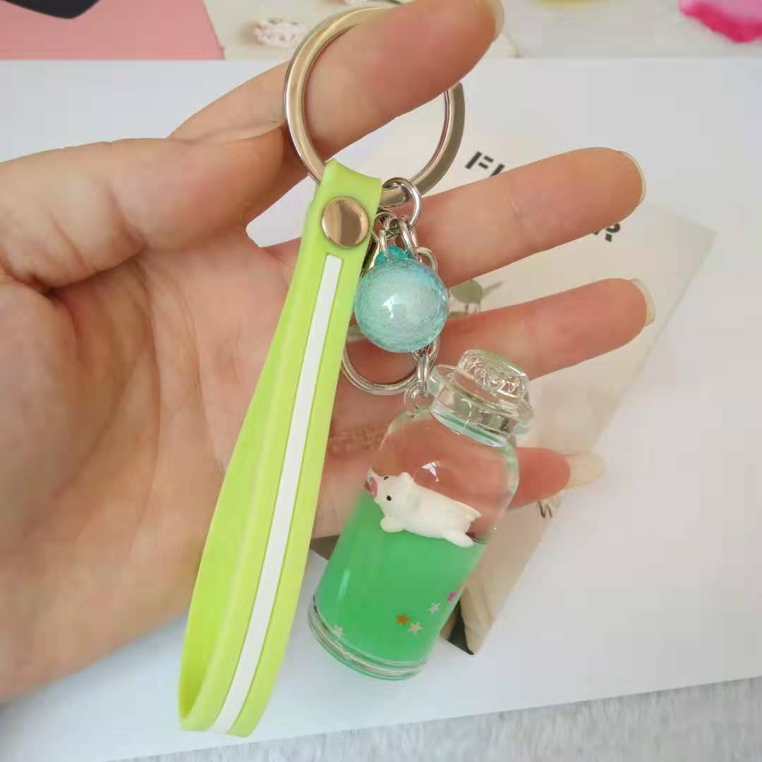 Green by PK Green Metal Penguin Bottle Opener on Keychain 