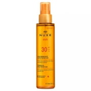 Nuxe Sun on sale in our organic pharmacy. A dry tanning and protective oil SPF 10 with cellular anti-aging protection for a sublime tan with a satin finish and no oily effect 150ml