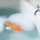 thumbnail image 1 of Pez dorado para baño Genuine Fred con luz color naranja, 1 of 2