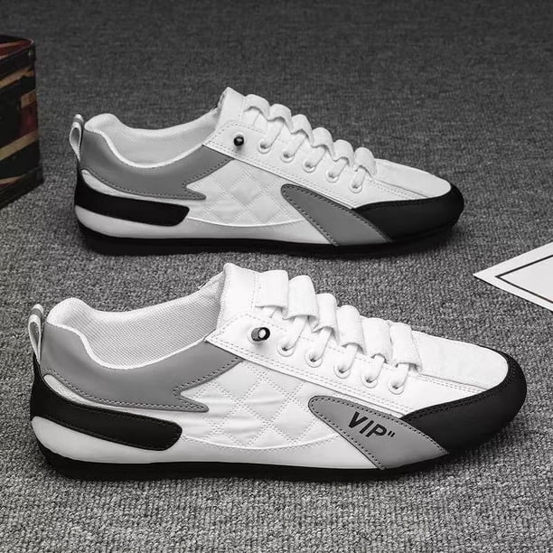 Zapatos de hombre de primavera y verano, zapatos de lona transpirables, zapatos blancos de moda para todos los partidos, zapatillas de deporte sin cordones