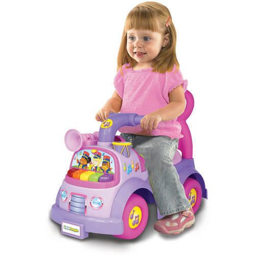 Fisher price music parade ride store on pink