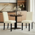 thumbnail image 2 of DyFun Upholstered Dining Chairs Set of 2, Faux Leather Parsons Side Chairs with Upgraded Cushion for Dining Room, Ivory, 2 of 10