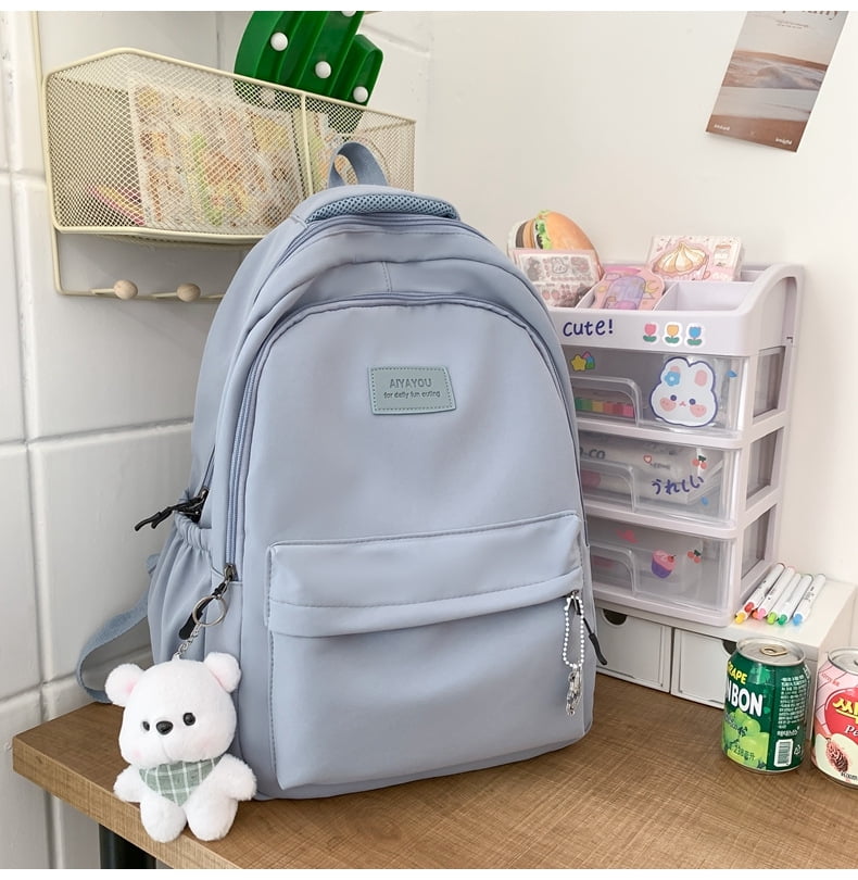 Student Japanese large-capacity backpack Teenagers simple and versatile backpack Unisex polyester material Doll decoration