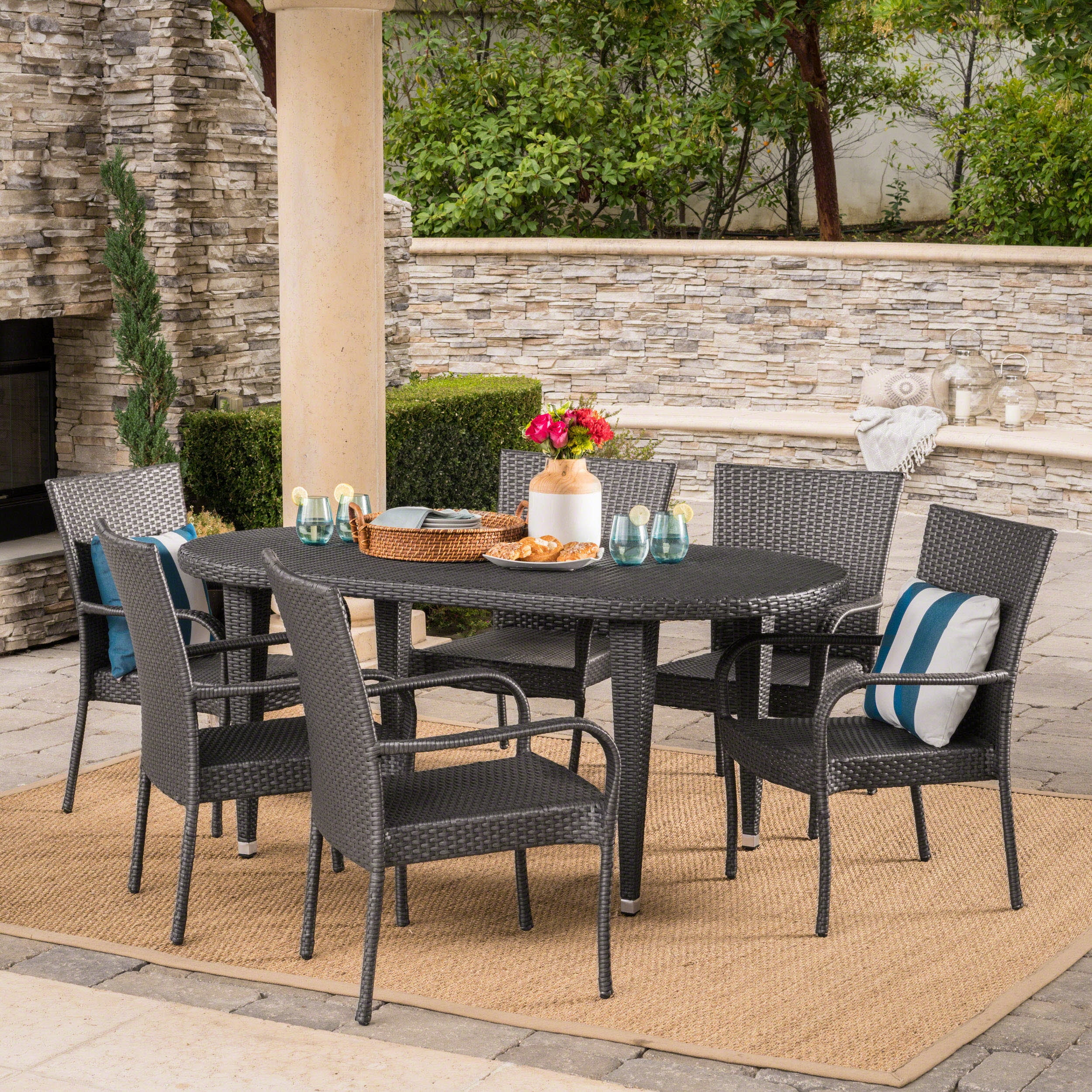 Canterbury Outdoor 7 Piece Wicker Oval Dining Set With Stacking Chairs