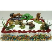 lion king birthday cake topper set featuring mufassa, zazu, pumbaa, scar, timon, nala, simba and decorative rocks, safari grass, and tree of life themed pieces