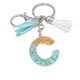 thumbnail image 1 of Llavero de letras con borlas verdes | Colgante de cristal acrílico | Lámina de oro, pegamento en gota, joyería de piedra engrosada | Amuleto de bolso con estilo, accesorio para mochila | 1 pieza, 1 of 2