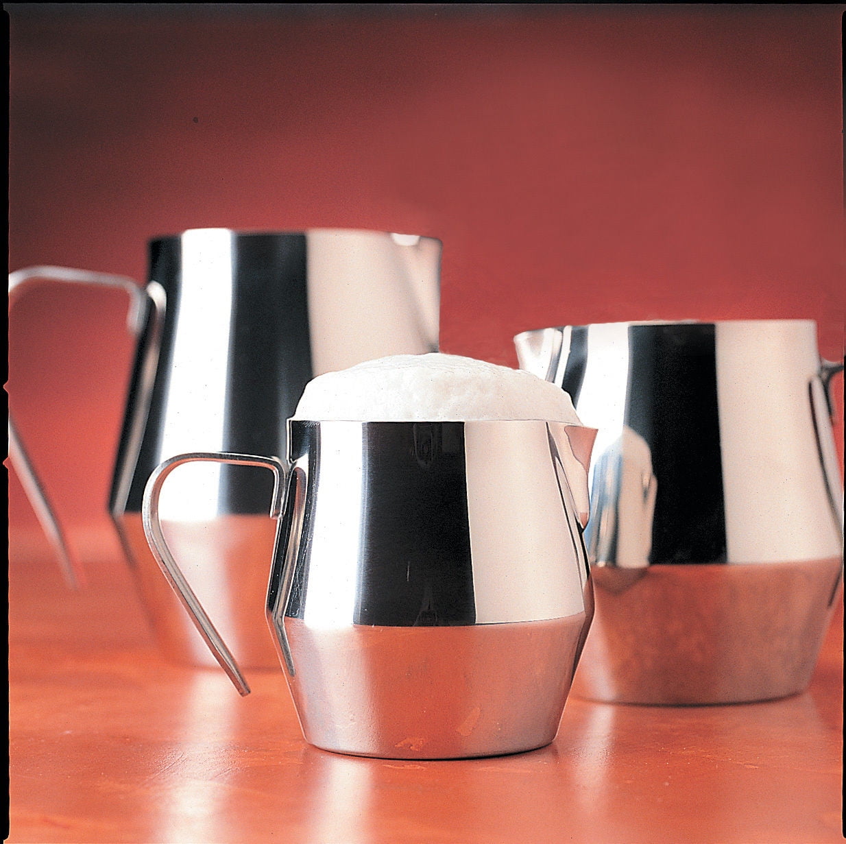 The Rsvp Stainless Steel 10oz. Steaming Frothing Pitcher is a versatile and reliable tool that is essential in any coffee lover's kitchen. This pitcher is designed for steaming and frothing milk for lattes, cappuccinos, and other coffee specialties. It is made of high-quality, durable stainless steel, which ensures that it can withstand the demands of everyday use without rusting or corroding.