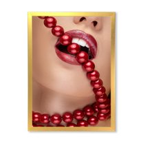 Designart 'Girl Mouth With Red Lipstick Biting Red Pearls' Modern Framed Art Print