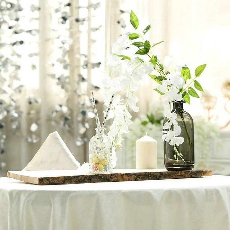 Rustic Engagements - This is often a popular centerpiece amongst our  clients with the wood slab and different variations of decor and/or florals  to make a statement on our couples guest tables!