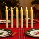 thumbnail image 4 of Velas de cera de 7,5 pulgadas, sin llama, a pilas, con temporizador y regulador de intensidad, 6 portavelas blancos para ceremonias, fiestas, Navidad y Halloween., 4 of 5