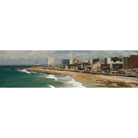 Tourists on the Porto Da Barra Beach with Farol Da Barra Lighthouse in background Salvador Bahia Brazil Poster